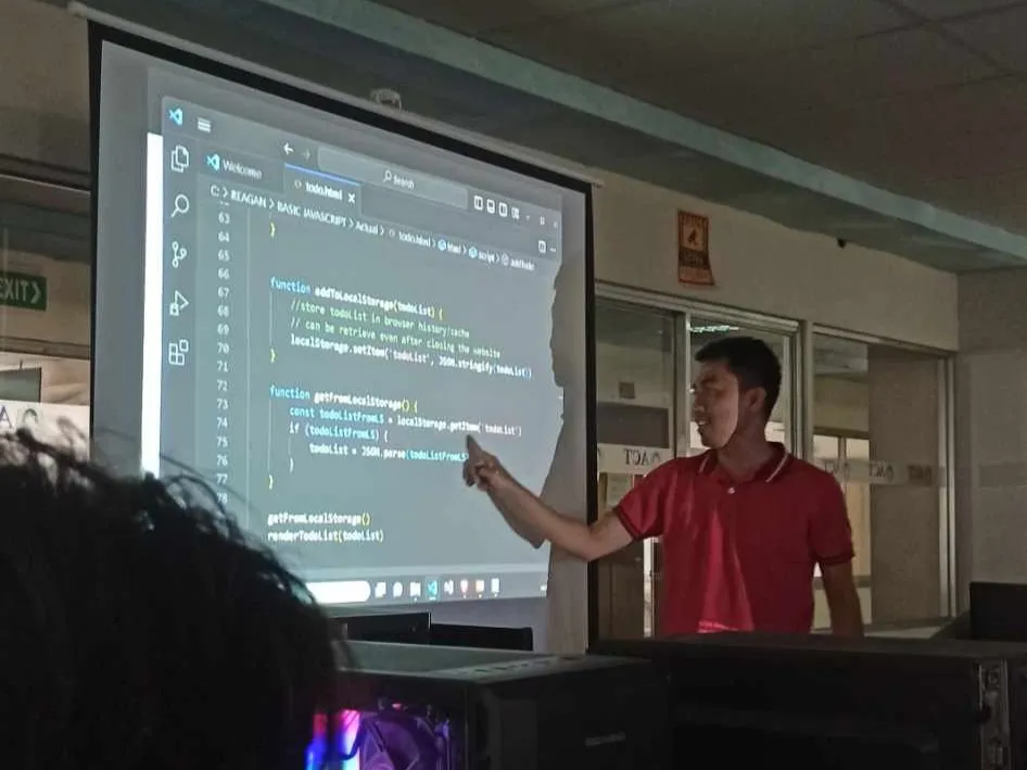 KaSocius founder leading JavaScript training session for students